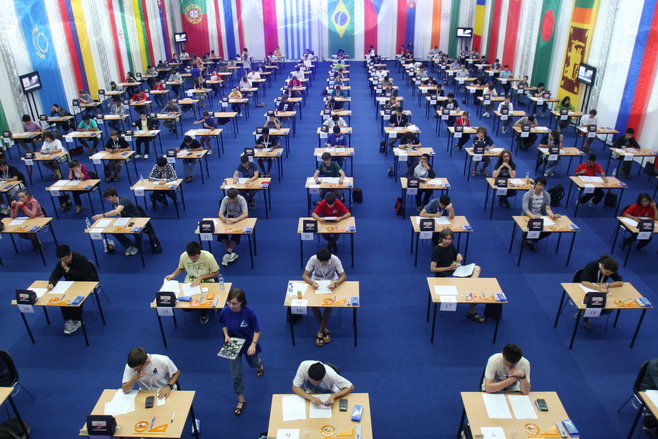 Participants attempting data analysis round during IOAA 2011